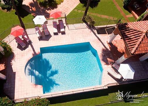 Aerial view of the swimming pool at Palmyra Golf, a 4-star hotel in the Hérault region of France